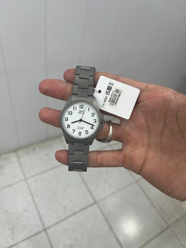 ساعت مچی مردانه کیو اند کیو مدل S28A-001VY با بند تیتانیوم